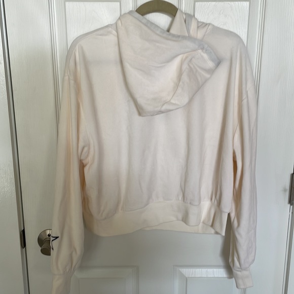 Cream hoodie with navy drawstring and star on left sleeve. Size XL. - Picture 2 of 9